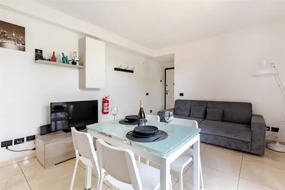 Living room with sofa and dining area